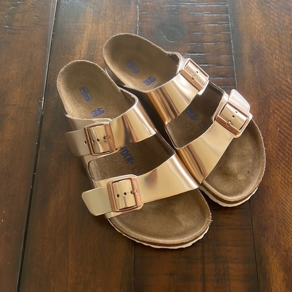 Metallic rose gold Birkenstocks. Size 40. Never worn but no box.